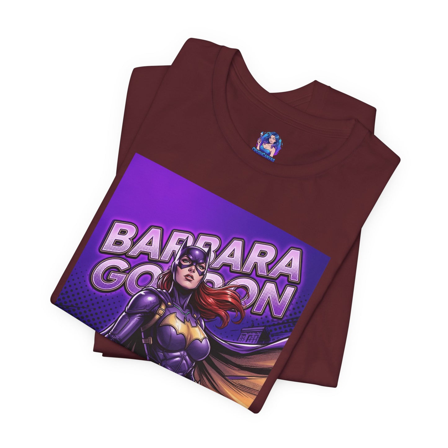 Batgirl T-Shirt | DC Comics Anime Tee for Gamers & Fans folded maroon Bella Canvas tee with comic-style Batgirl illustration