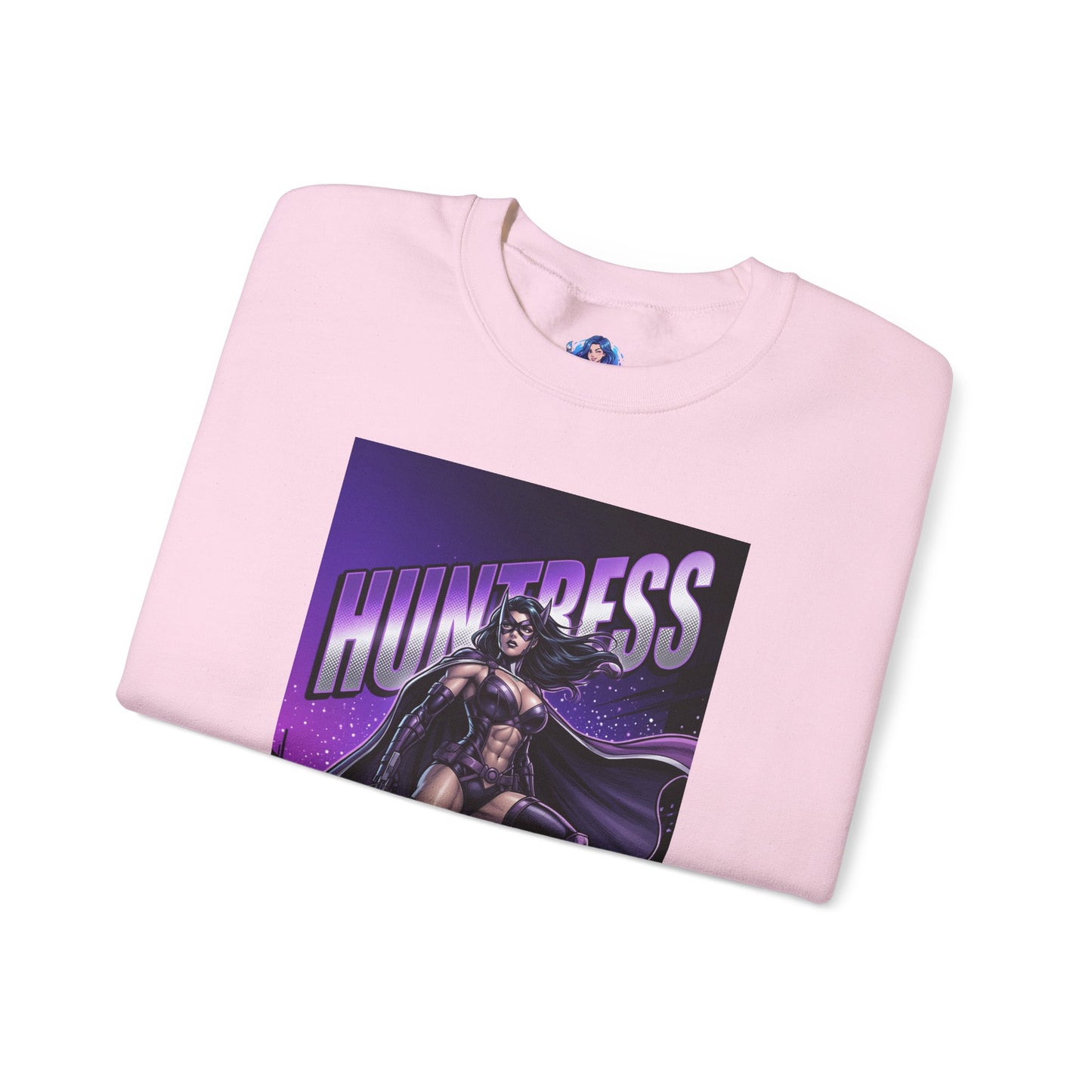 Huntress Sweatshirt, DC Comics Character Art, Premium Fan Apparel folded pink crewneck with bold rooftop Huntress art