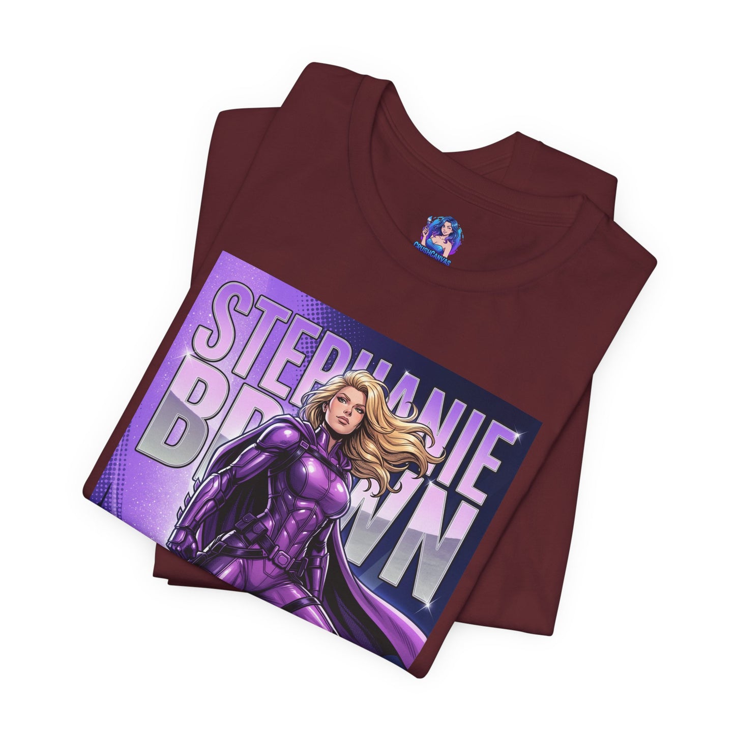Alt Tag: Stephanie Brown T-Shirt | DC Comics Anime Tee for Gamers & Fans folded maroon Bella Canvas tee with purple Batgirl-era illustration