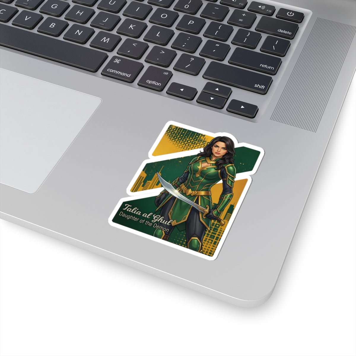 Talia al Ghul Sticker – Comic Villain Vinyl Sticker for Laptops & Indoor Decor showing glossy vinyl laptop sticker of Talia al Ghul in green armor with sword