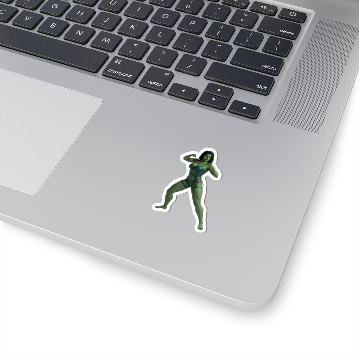 She-Hulk Sticker – Comic Heroine Vinyl Sticker for Laptops & Indoor Decor on silver laptop showing glossy, die-cut comic heroine sticker
