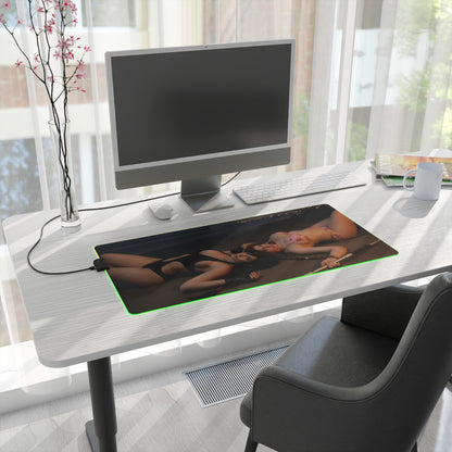 Tifa Lockhart and Aerith Gainsborough Desk Mat – LED RGB Pad on a modern gaming desk with green LED edge