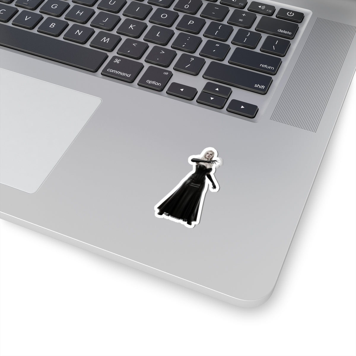 Lady Dimitrescu Sticker – Gothic Game Character Vinyl Sticker for Laptops & Decor on silver laptop showing glossy die-cut vinyl sticker of tall gothic character