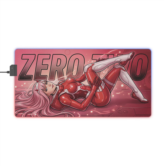 Zero Two RGB Desk Mat, Anime Gaming Mouse Pad, LED Desk Mat for Gamer Setup featuring reclining pink-haired anime character in red suit on LED mouse pad
