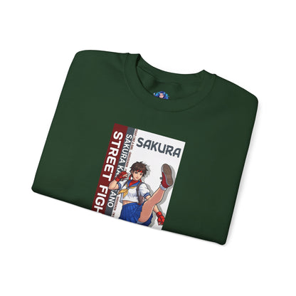 Sakura Sweatshirt, Street Fighter Crewneck, Classic Fighting Game Apparel for Fans folded green crewneck featuring Sakura character artwork and red-white design