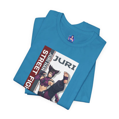 Juri Han T-Shirt | Street Fighter Anime Tee for Gamers & Fighting Game Fans folded blue Bella Canvas tee with bold Juri artwork