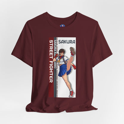 Sakura Kasugano T-Shirt | Street Fighter Anime Tee for Gamers & Fighting Game Fans - maroon tee with dynamic Sakura kick illustration