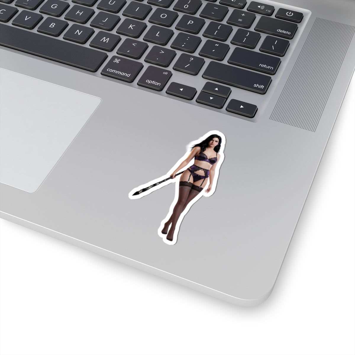 Yennefer Sticker – Fantasy Character Vinyl Sticker for Laptops & Indoor Decor on silver laptop showing dark elegant fantasy character vinyl decal