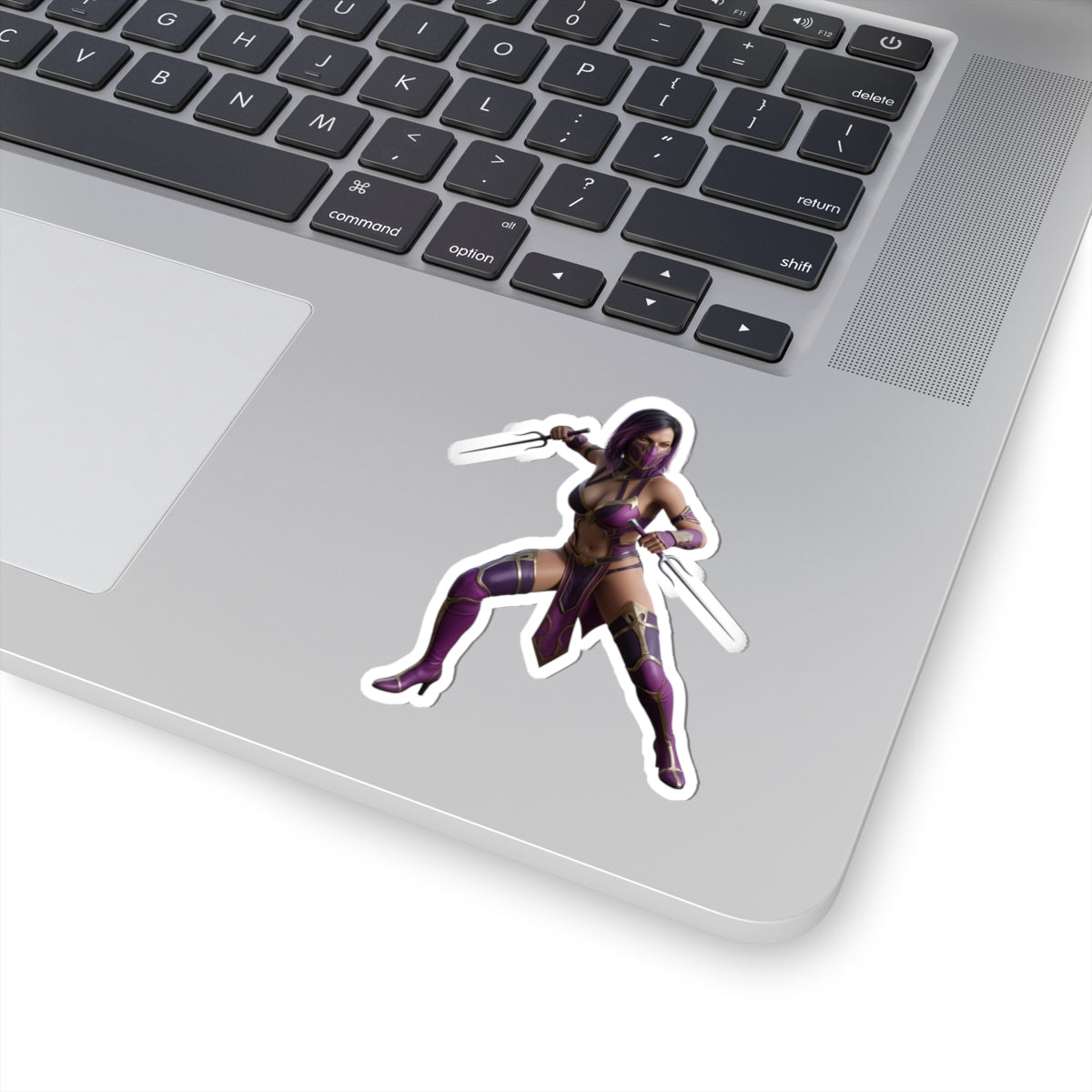 Mileena Sticker – Mortal Kombat Vinyl Sticker for Laptops & Indoor Decor on silver laptop showing purple-clad character decal