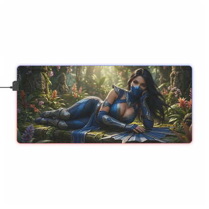 Kitana Desk Mat – LED RGB Pad, Waifu Fighter Anime Girl Setup showing a reclining blue-clad waifu fighter in a misty jungle with RGB glow