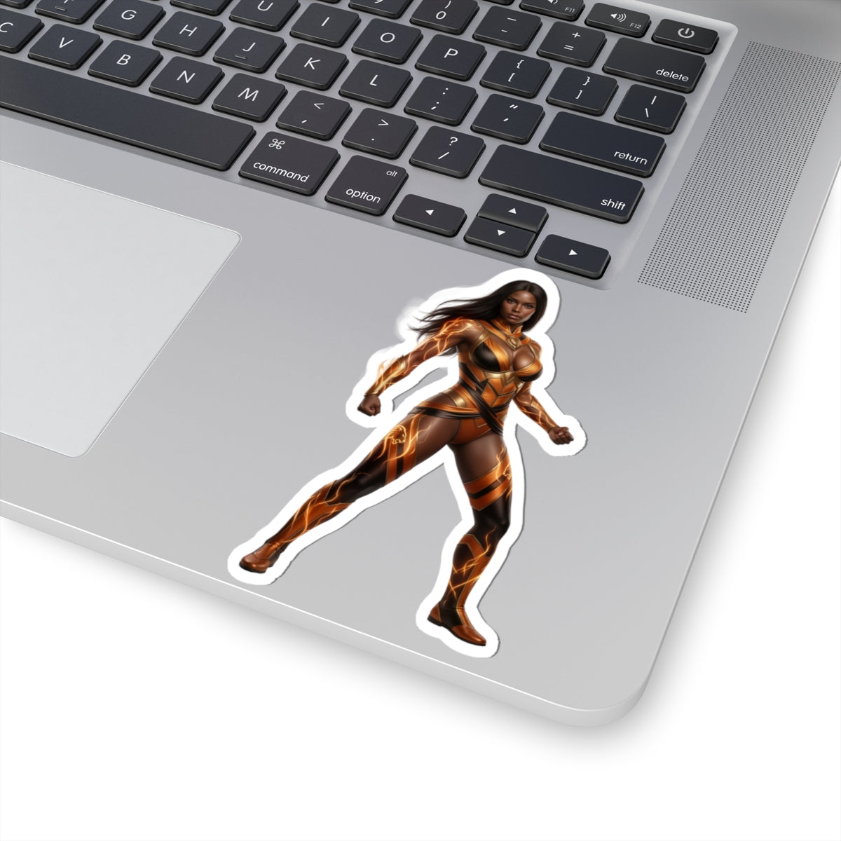 Vixen Sticker – Comic Heroine Vinyl Sticker for Laptops & Indoor Decor on silver laptop showing glossy, vibrant comic-style heroine vinyl sticker