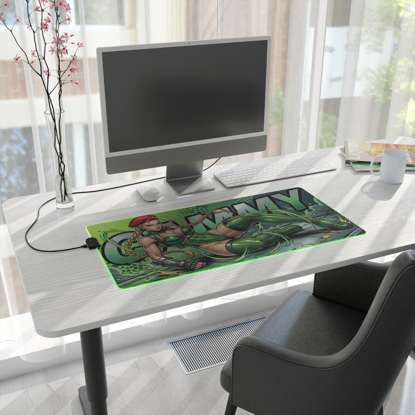 Cammy RGB Desk Mat, Fighting Game Gaming Mouse Pad, LED Desk Mat for Gamer Setup on white desk showing green military-inspired character artwork and LED edge