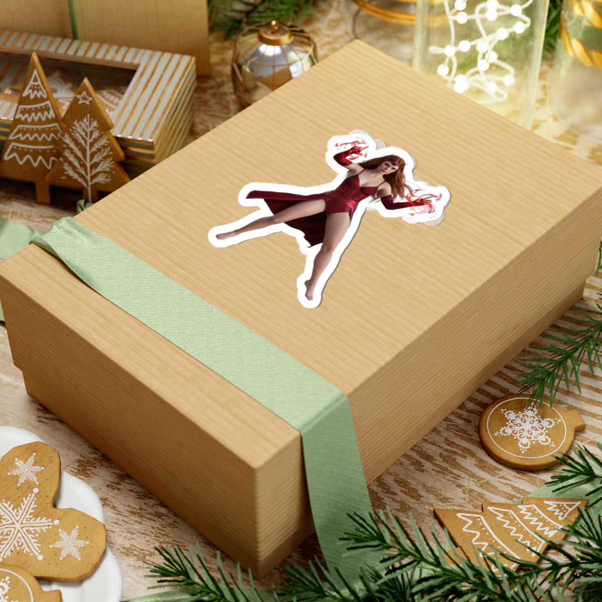 Scarlet Witch Sticker – Comic Heroine Vinyl Sticker for Laptops & Indoor Decor on gift-wrapped box, glossy vibrant vinyl decal of mystical comic heroine