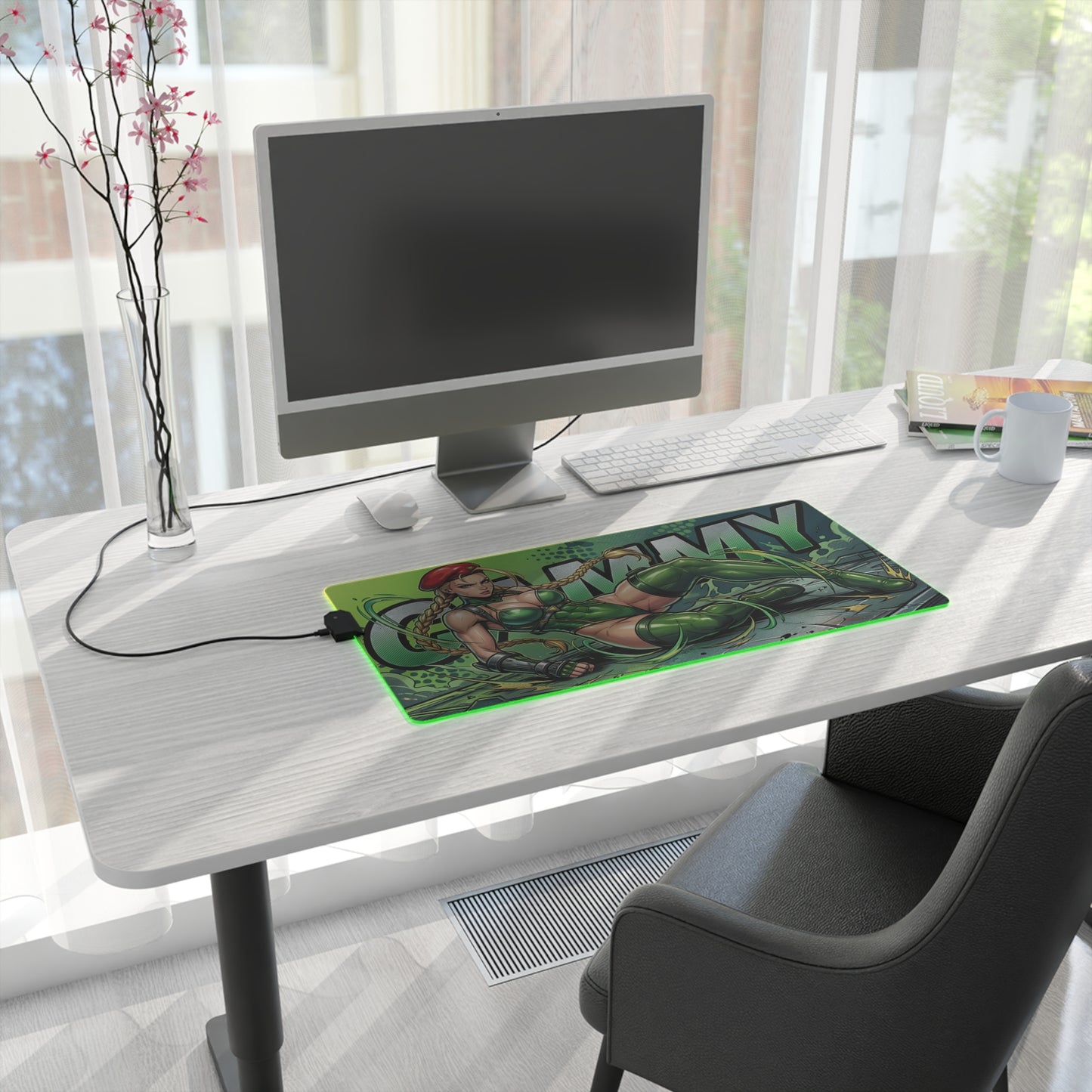 Cammy RGB Desk Mat, Fighting Game Gaming Mouse Pad, LED Desk Mat for Gamer Setup on white modern desk with PC and streaming-ready green military artwork