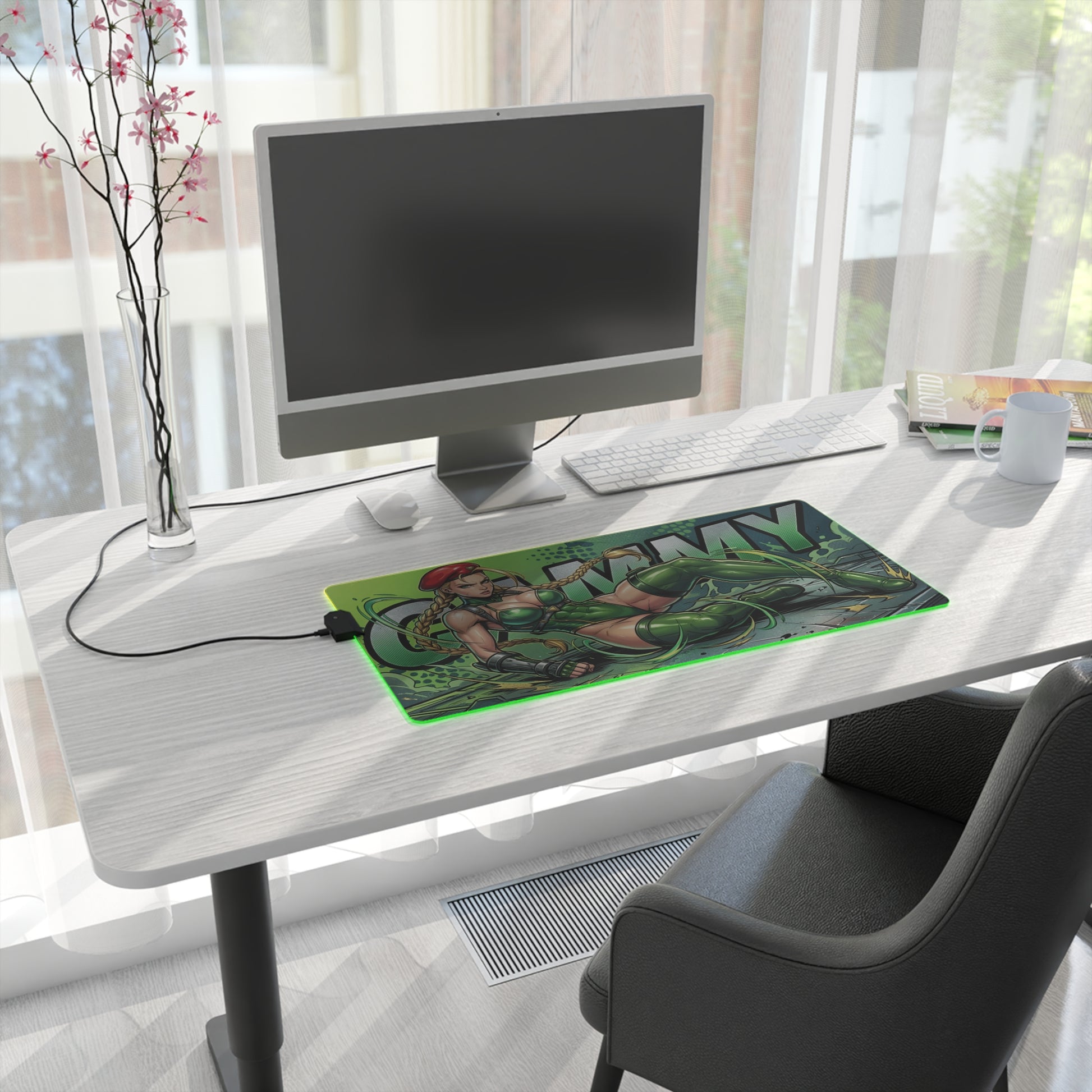 Cammy RGB Desk Mat, Fighting Game Gaming Mouse Pad, LED Desk Mat for Gamer Setup on white modern desk with PC and streaming-ready green military artwork