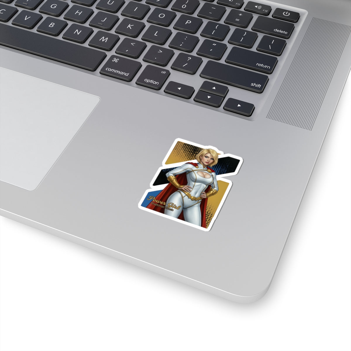 Power Girl Sticker – Comic Heroine Vinyl Sticker for Laptops & Indoor Decor on silver laptop showing glossy vibrant print and bubble-free application