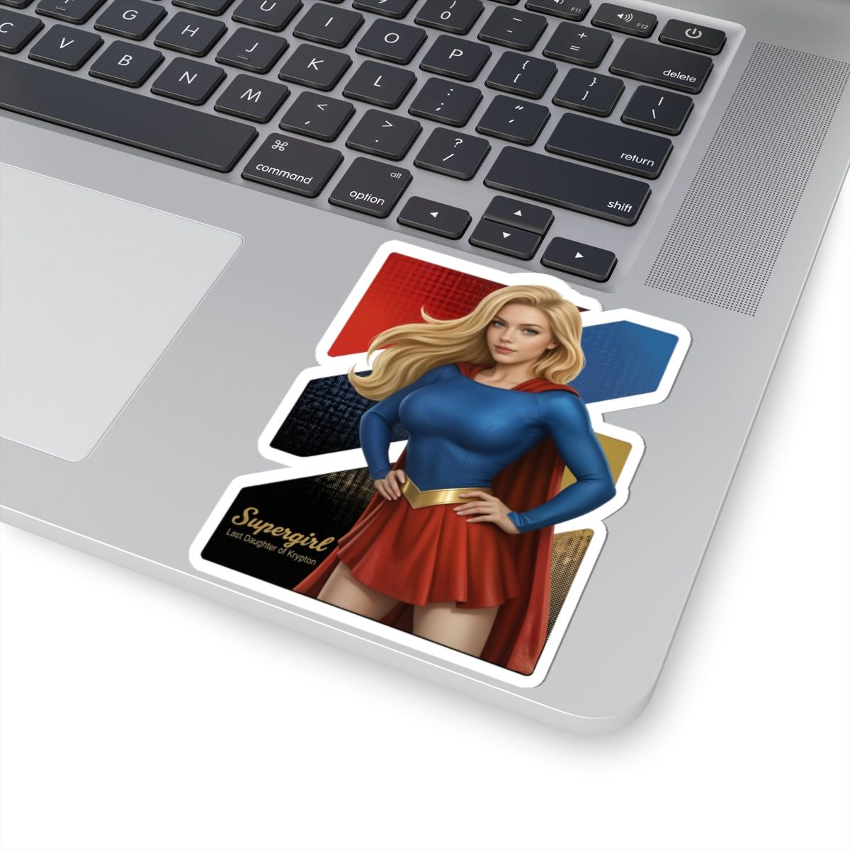 Supergirl Sticker – Superhero Vinyl Sticker for Laptops & Indoor Decor on silver laptop showing glossy, vibrant vinyl decal with strong adhesive