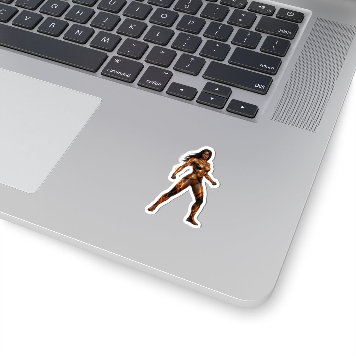 Vixen Sticker – Comic Heroine Vinyl Sticker for Laptops & Indoor Decor showing glossy comic-style heroine vinyl sticker on silver laptop