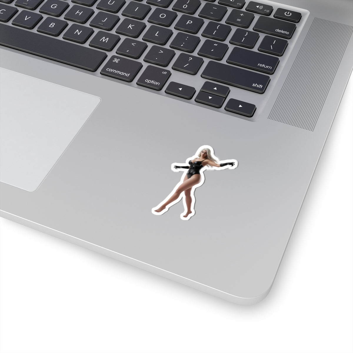 Black Cat Sticker – Comic Character Vinyl Sticker for Laptops & Indoor Decor on silver laptop, glossy durable vinyl, crisp comic-style black cat design