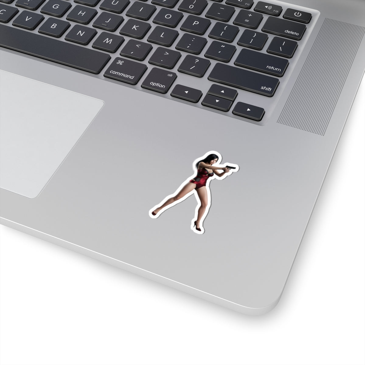 Ada Wong Sticker – Iconic Game Character Vinyl Sticker for Laptops & Indoor Decor: glossy durable vinyl laptop sticker showing Ada Wong aiming pistol
