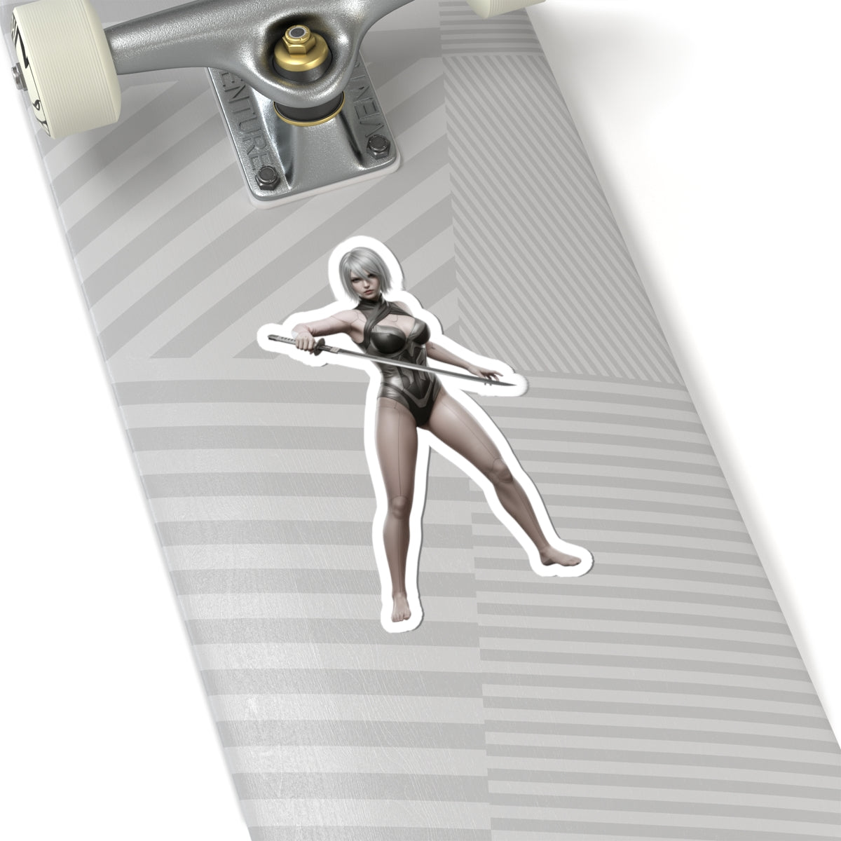 A2 Nier Sticker – Sci-Fi Game Vinyl Sticker for Laptops & Indoor Decor on gray skateboard laptop decal showing glossy, detailed sci-fi character art