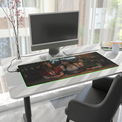 Tifa Lockhart, Aerith Gainsborough & Yuffie Kisaragi Desk Mat – LED RGB Pad on a clean modern desk with green LED glow