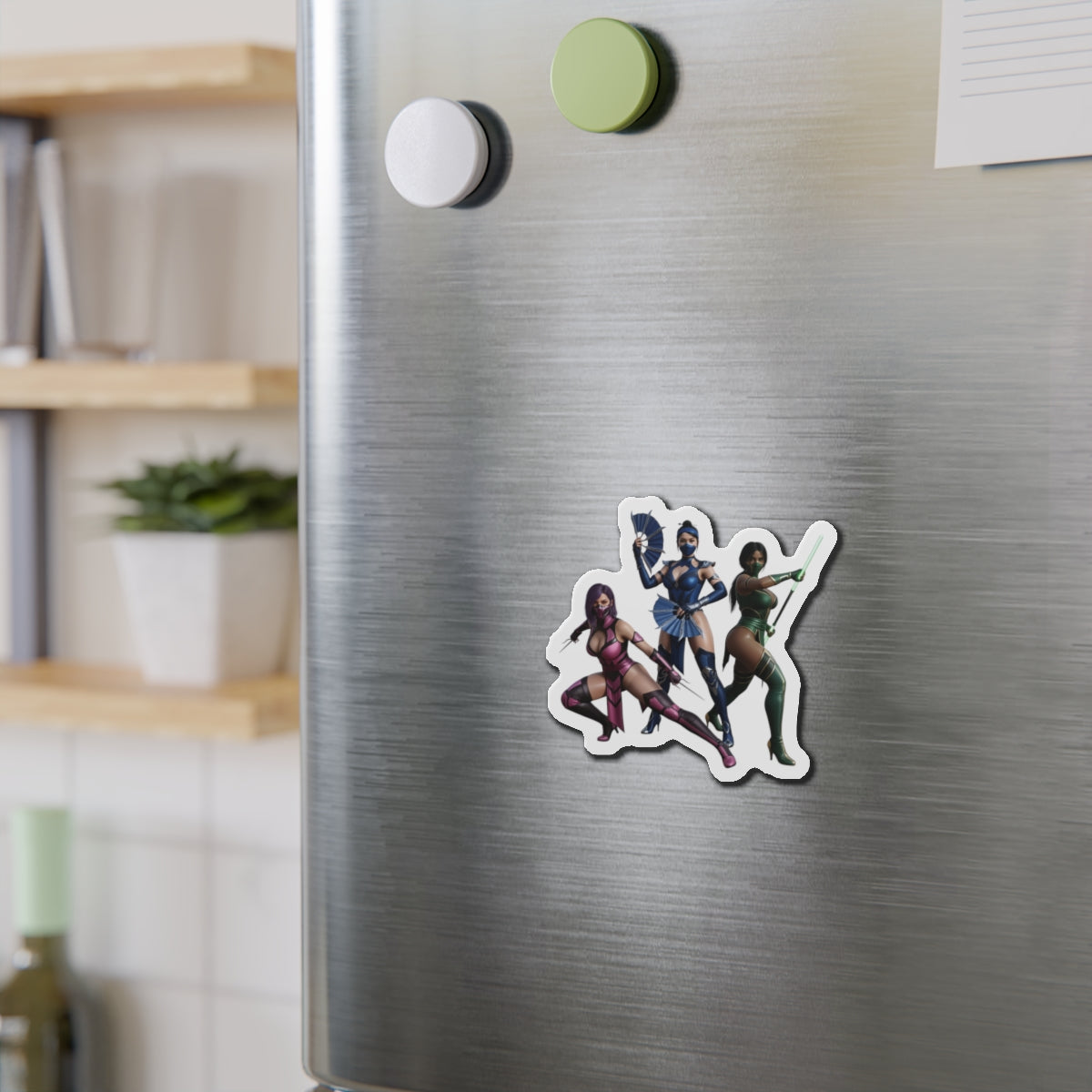 Kitana, Jade, Mileena Magnet – Mortal Kombat Anime Trio Fridge Magnet die-cut vinyl magnet on stainless fridge showing anime-style trio