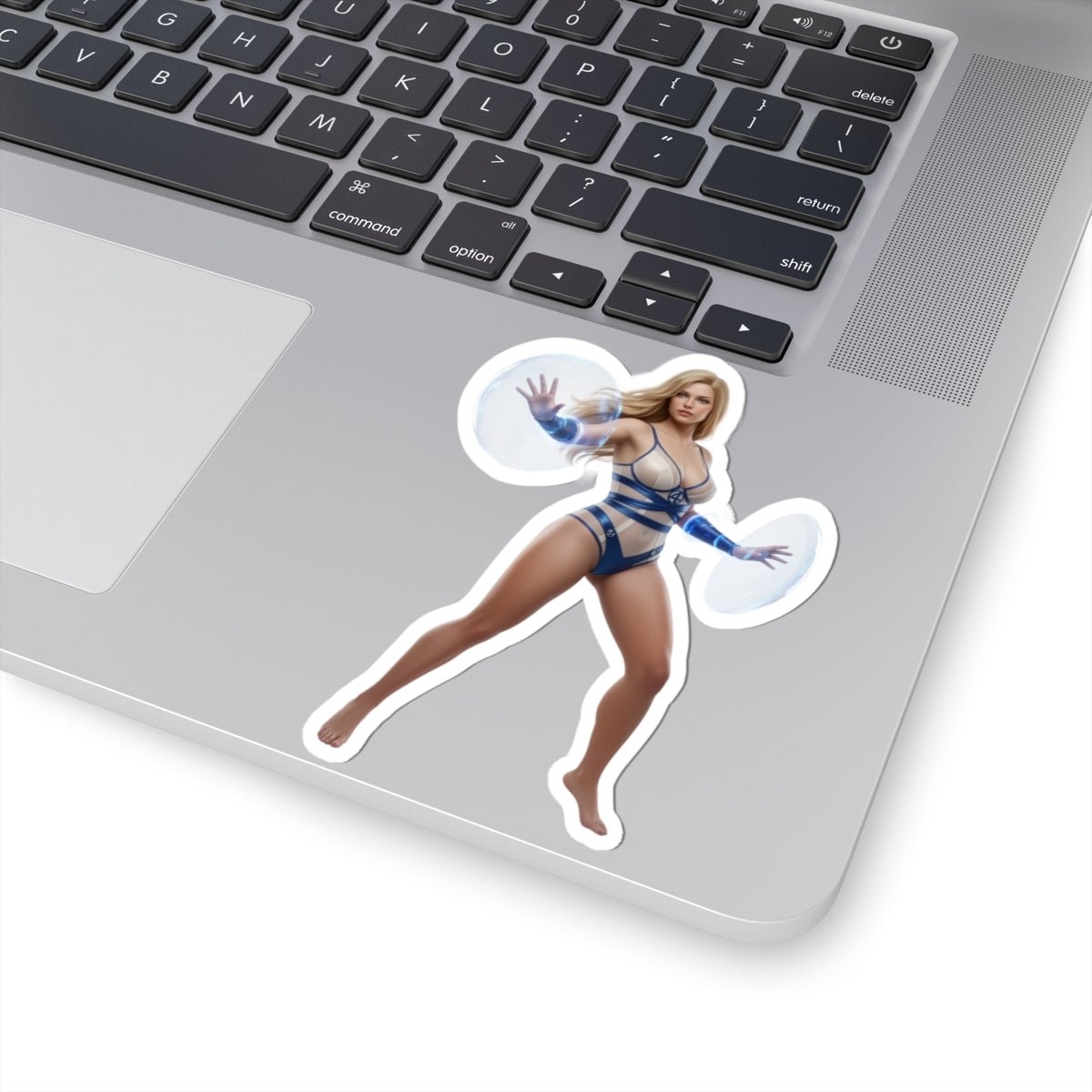 Invisible Woman Sticker – Comic Heroine Vinyl Sticker for Laptops & Indoor Decor on silver laptop, glossy durable vinyl, bubble-free application