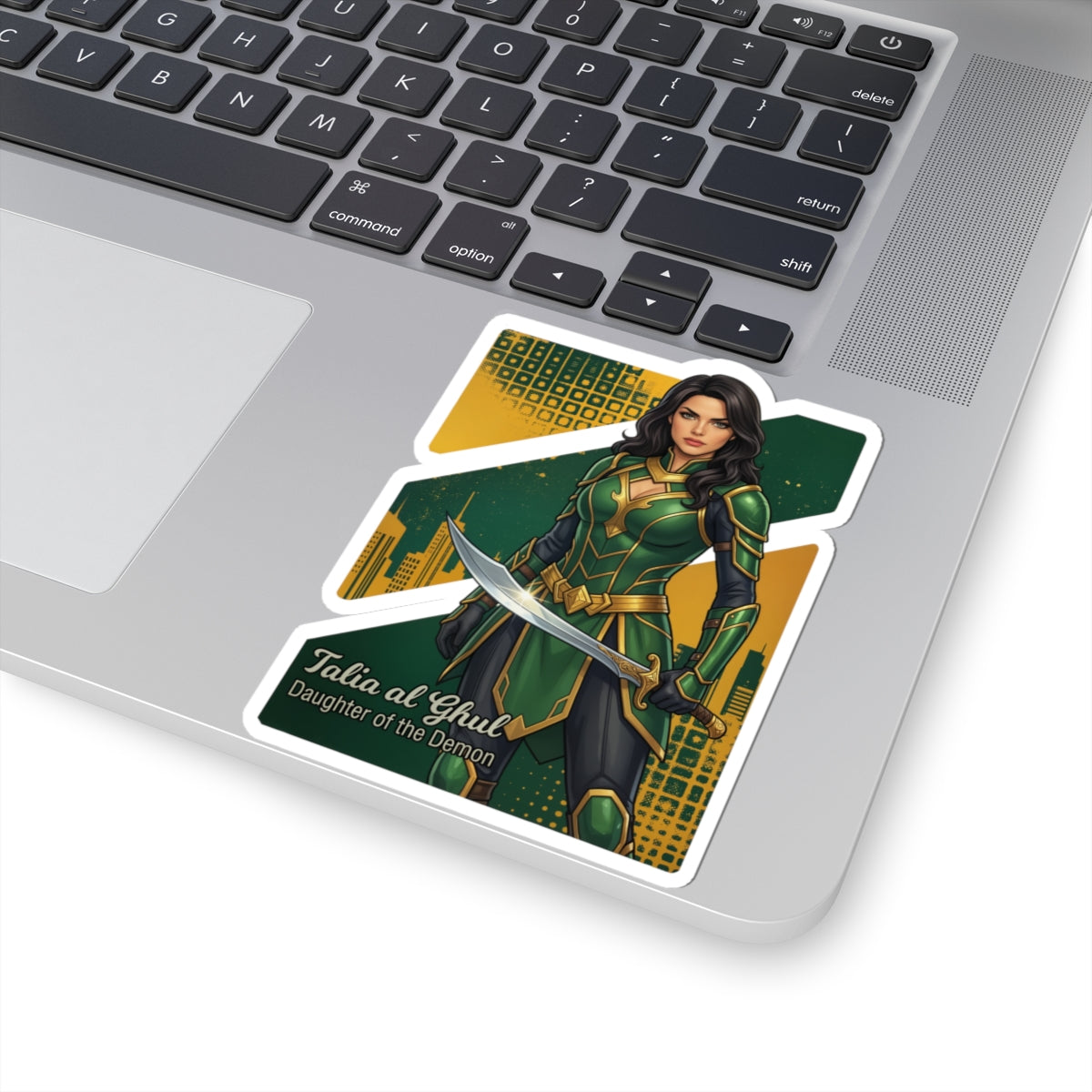 Talia al Ghul Sticker – Comic Villain Vinyl Sticker for Laptops & Indoor Decor: glossy vinyl sticker of Talia in green armor with sword on laptop