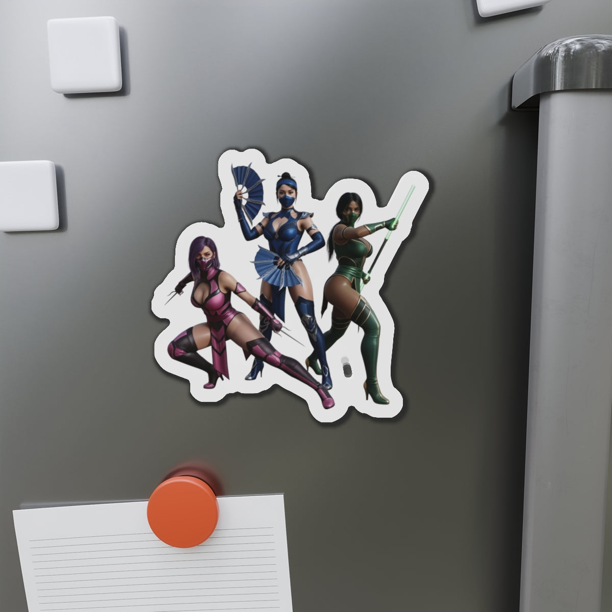 Kitana, Jade, Mileena Magnet – Mortal Kombat Anime Trio Fridge Magnet premium die-cut vinyl magnet on a grey fridge showing trio anime-style artwork