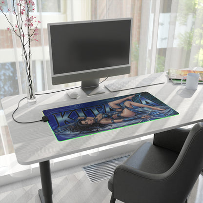 Kitana RGB Desk Mat, Mortal Kombat Gaming Mouse Pad, LED Desk Mat for Gamer Setup on a clean white desk with blue character artwork and green RGB glow