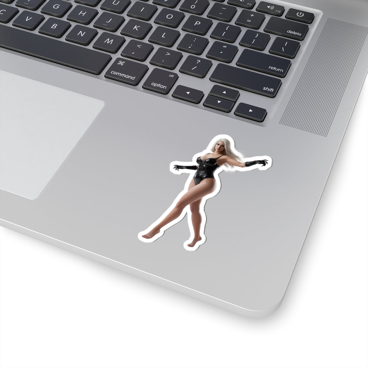 Black Cat Sticker – Comic Character Vinyl Sticker for Laptops & Indoor Decor on silver laptop corner, glossy durable vinyl, bubble-free application