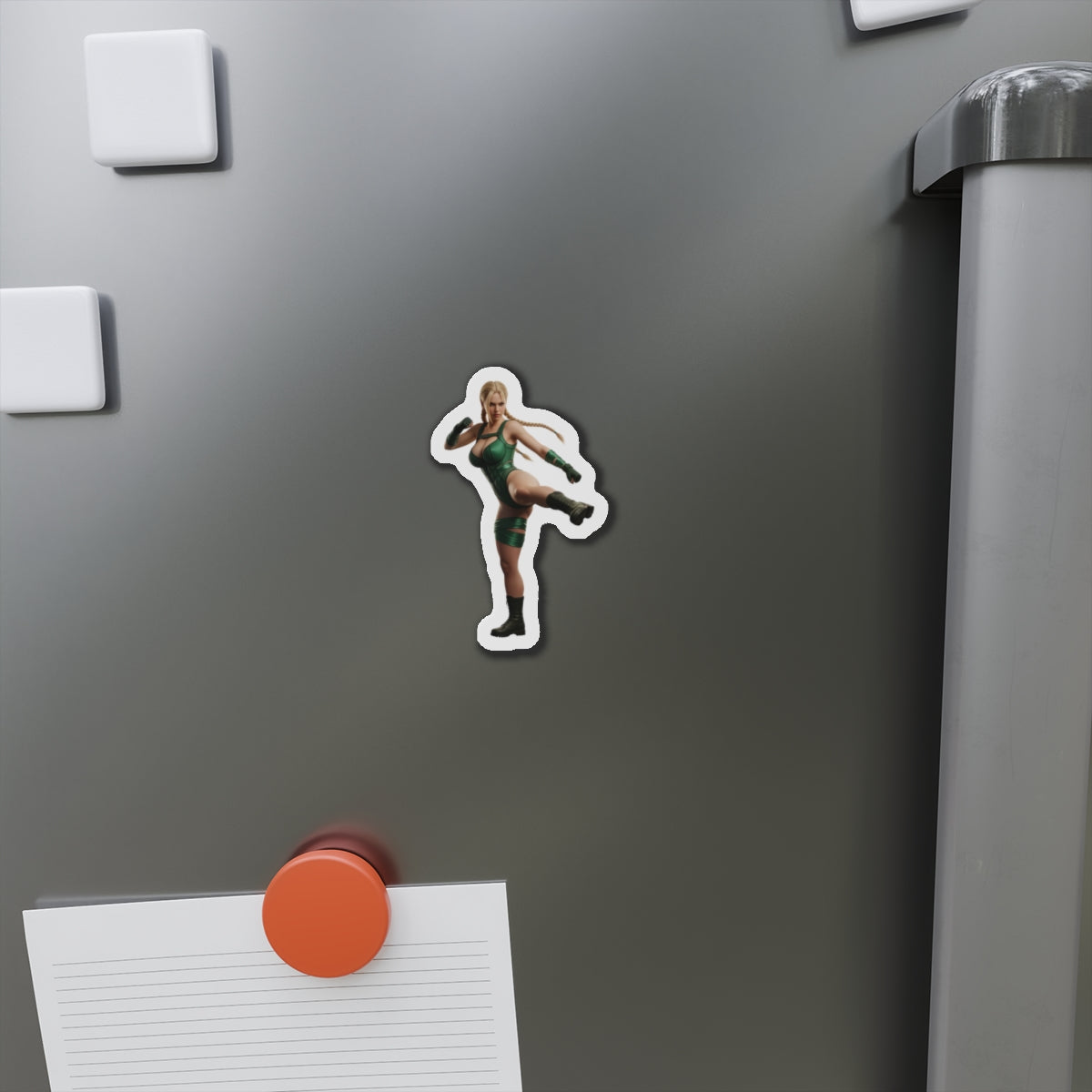 Cammy White Magnet – Street Fighter Anime Heroine Fridge Magnet, Game Decor on gray fridge showing die-cut vinyl magnet of Cammy in kicking pose