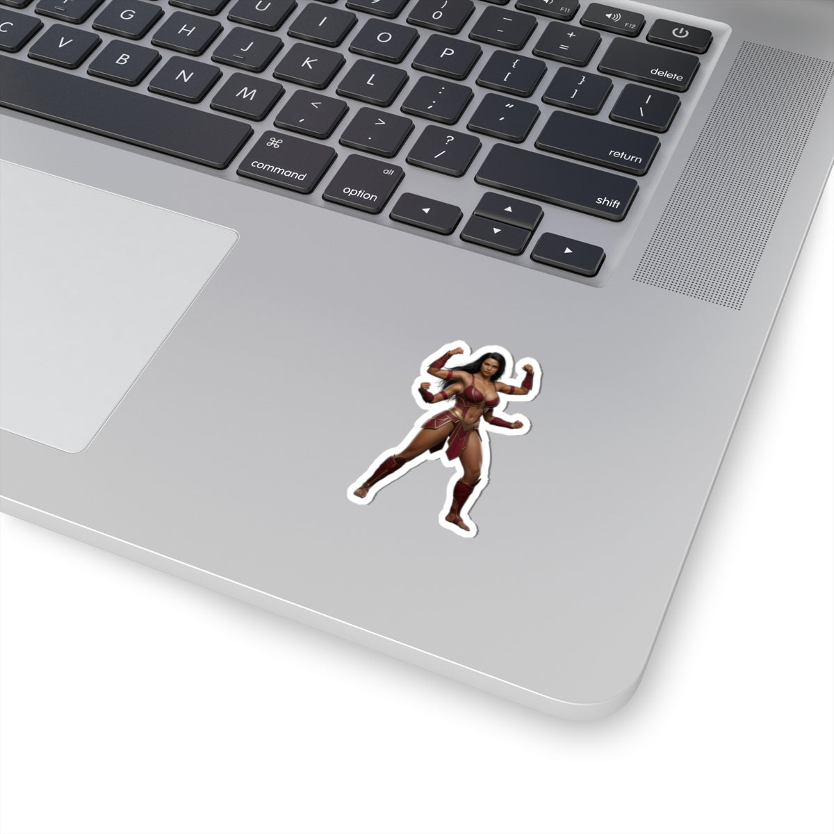 Sheeva Sticker – Mortal Kombat Vinyl Sticker for Laptops & Indoor Decor on silver laptop showing glossy durable vinyl sticker of Sheeva with strong pose