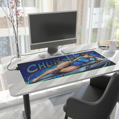 Chun-Li RGB Desk Mat, Fighting Game Gaming Mouse Pad, LED Desk Mat for Gamer Setup on white desk with blue character artwork and RGB edge