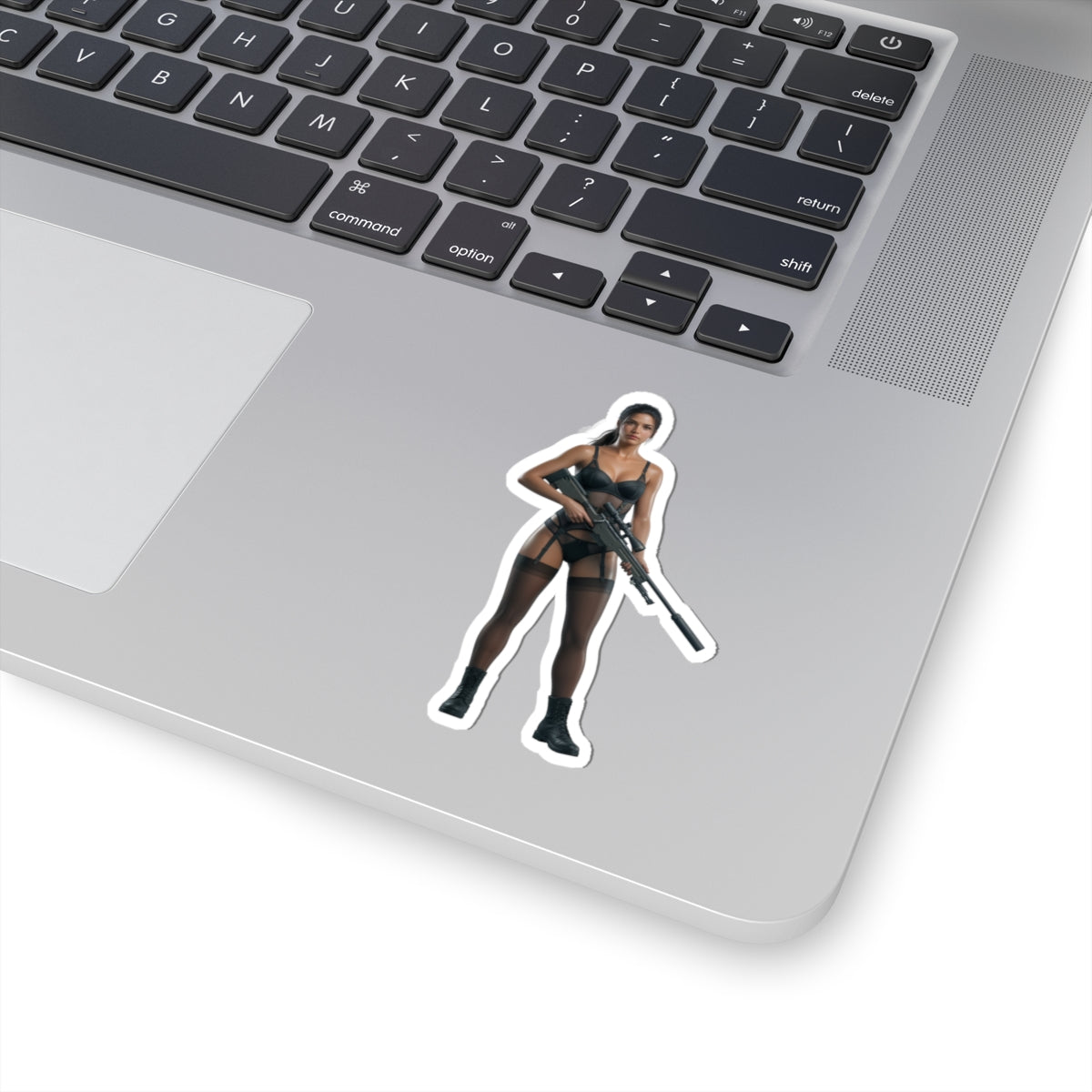 Quiet Metal Gear Sticker – Stealth Game Vinyl Sticker for Laptops & Indoor Decor on silver laptop showing glossy tactical character vinyl sticker