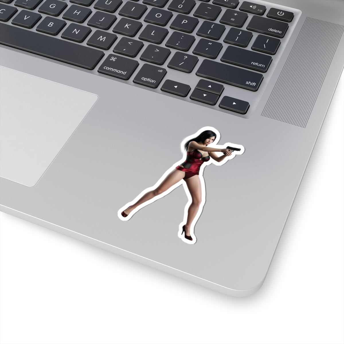 Ada Wong Sticker – Iconic Game Character Vinyl Sticker for Laptops & Indoor Decor on silver laptop, glossy durable vinyl decal with vibrant colors and strong adhesive