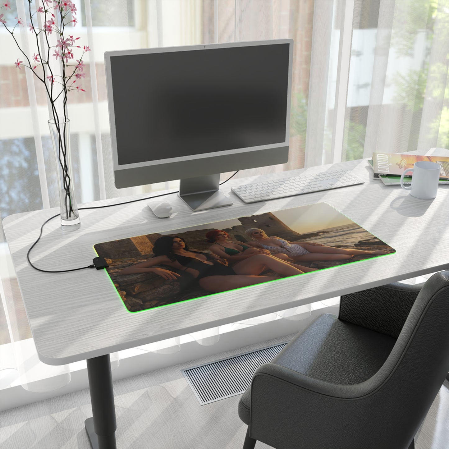 Ciri, Triss Merigold & Yennefer Desk Mat – LED RGB Pad on modern white desk with monitor, green RGB glow and three heroines artwork