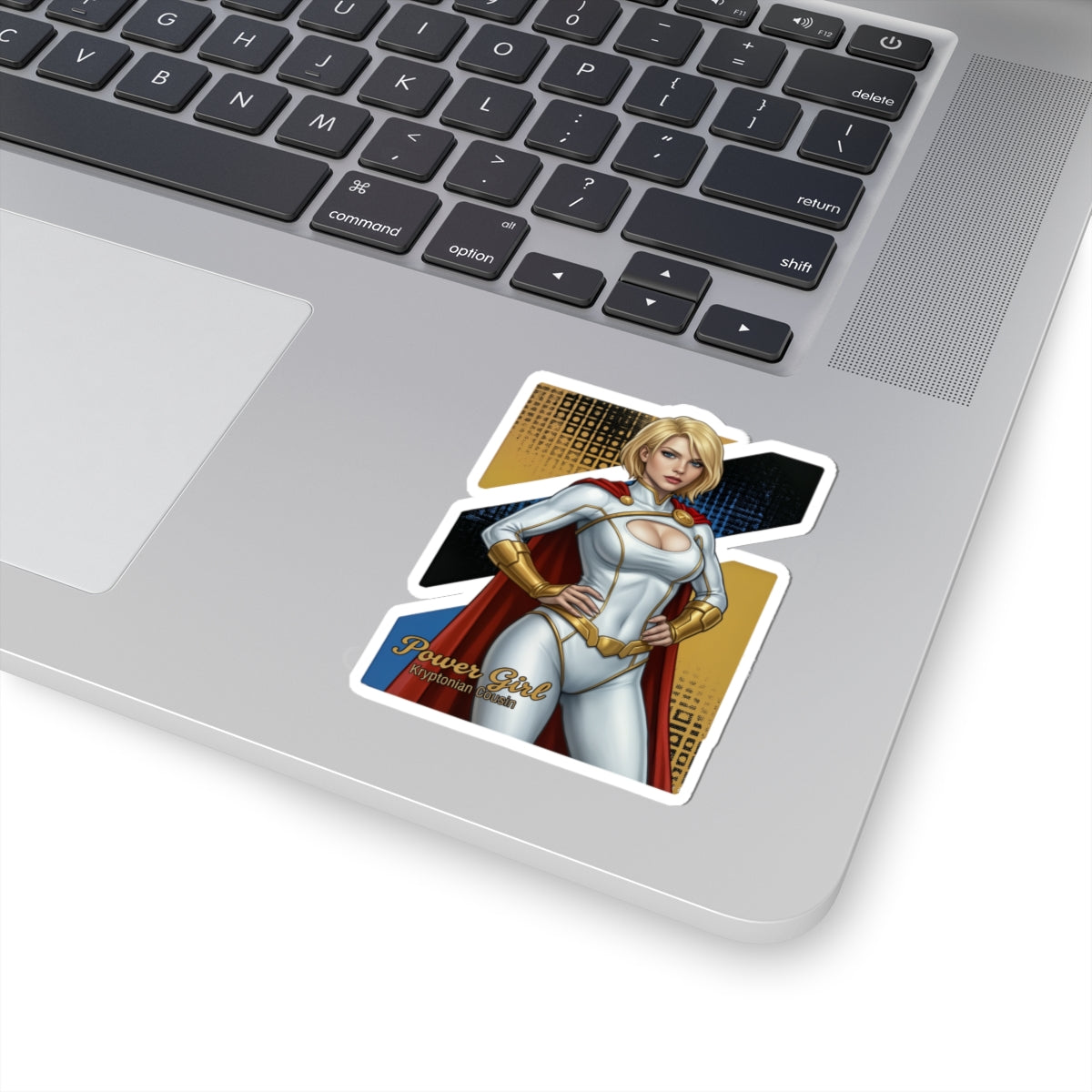 Power Girl Sticker – Comic Heroine Vinyl Sticker for Laptops & Indoor Decor on silver laptop showing bold comic-style heroine vinyl sticker with glossy finish