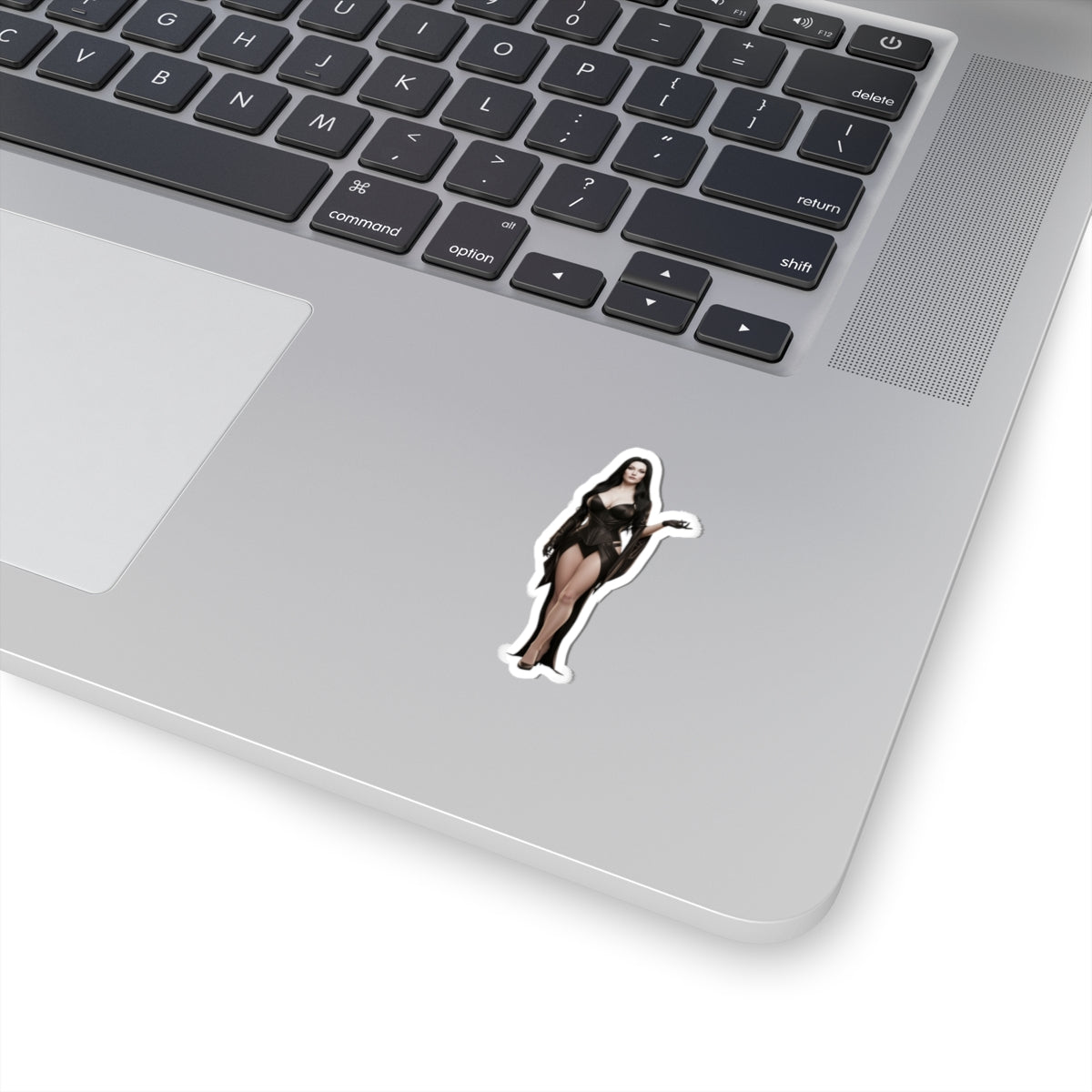 Morticia Addams Sticker – Gothic Character Vinyl Sticker for Laptops & Indoor Decor on silver laptop showing glossy durable vinyl, crisp detail, bubble-free application