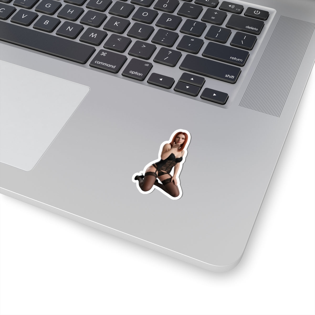 Black Widow Sticker – Comic Heroine Vinyl Sticker for Laptops & Indoor Decor on silver laptop showing glossy, durable vinyl, bubble-free application