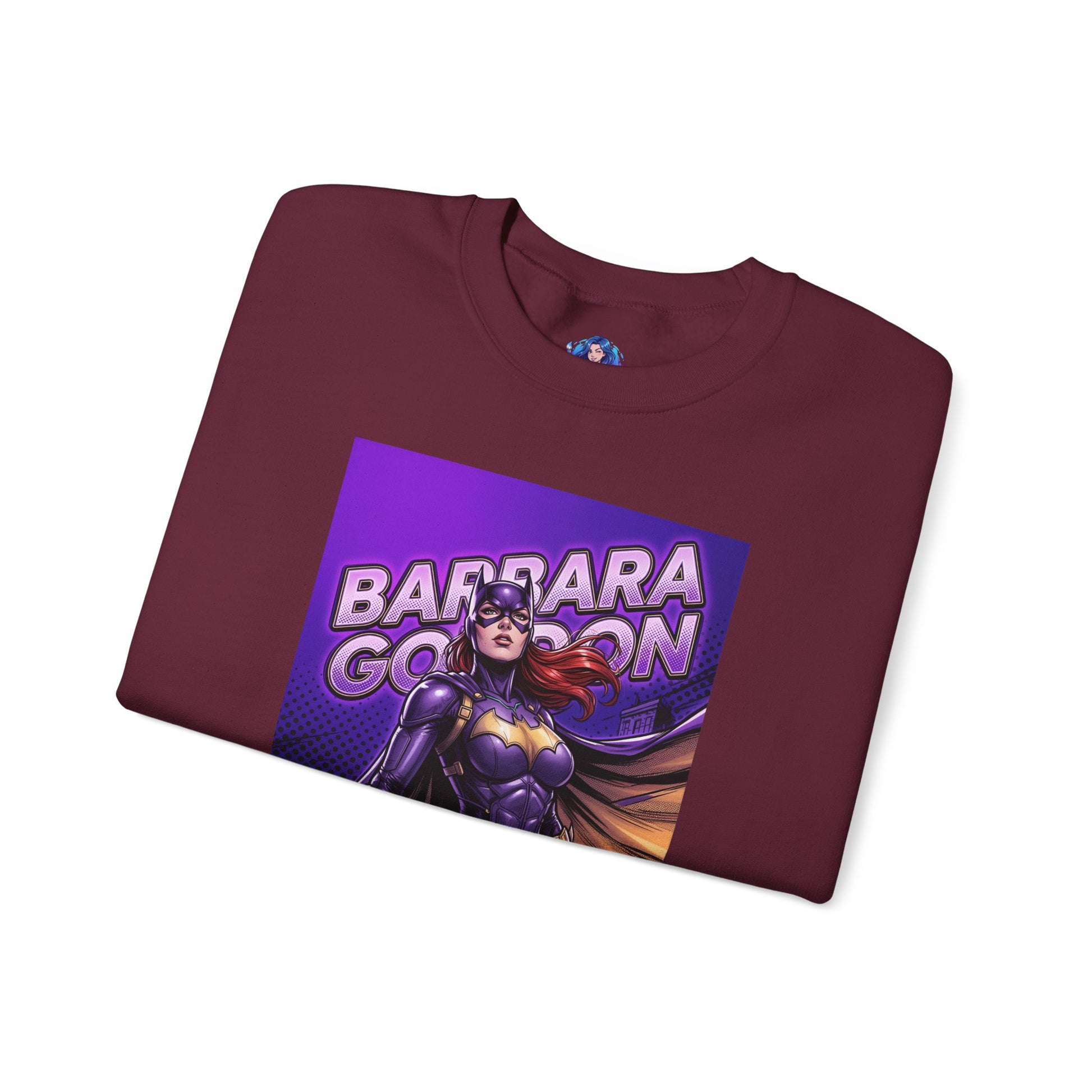 Batgirl Sweatshirt, DC Comics Crewneck, Gotham Hero Fan Apparel featuring purple-and-gold Batgirl graphic on maroon folded crewneck