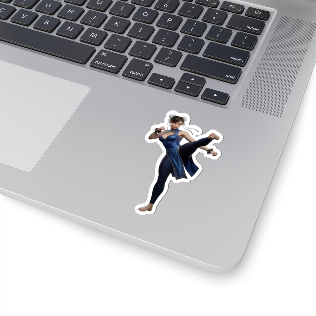 Chun-Li Sticker – Street Fighter Vinyl Sticker for Laptops & Indoor Decor on silver laptop showing glossy durable vinyl decal with vibrant colors and clear adhesive