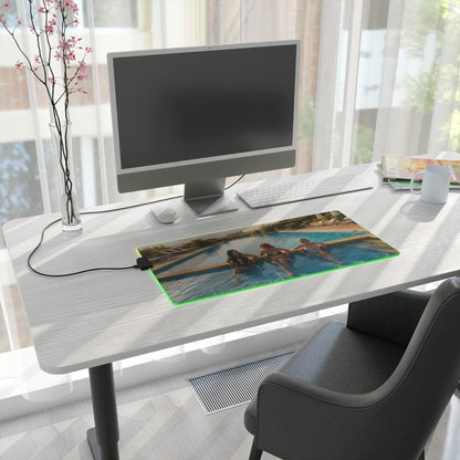 Ciri, Triss Merigold & Yennefer Desk Mat – LED RGB Pad on modern white desk with RGB glow, trio artwork centerpiece for gaming and creative setups