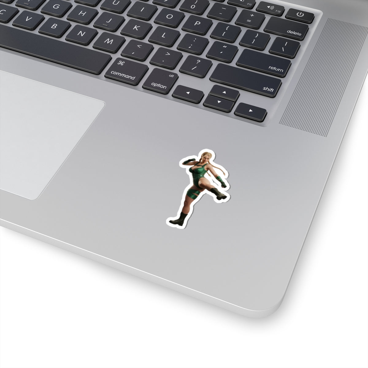 Cammy White Sticker – Street Fighter Vinyl Sticker for Laptops & Indoor Decor on silver laptop showcasing glossy durable vinyl, crisp detail and strong adhesive