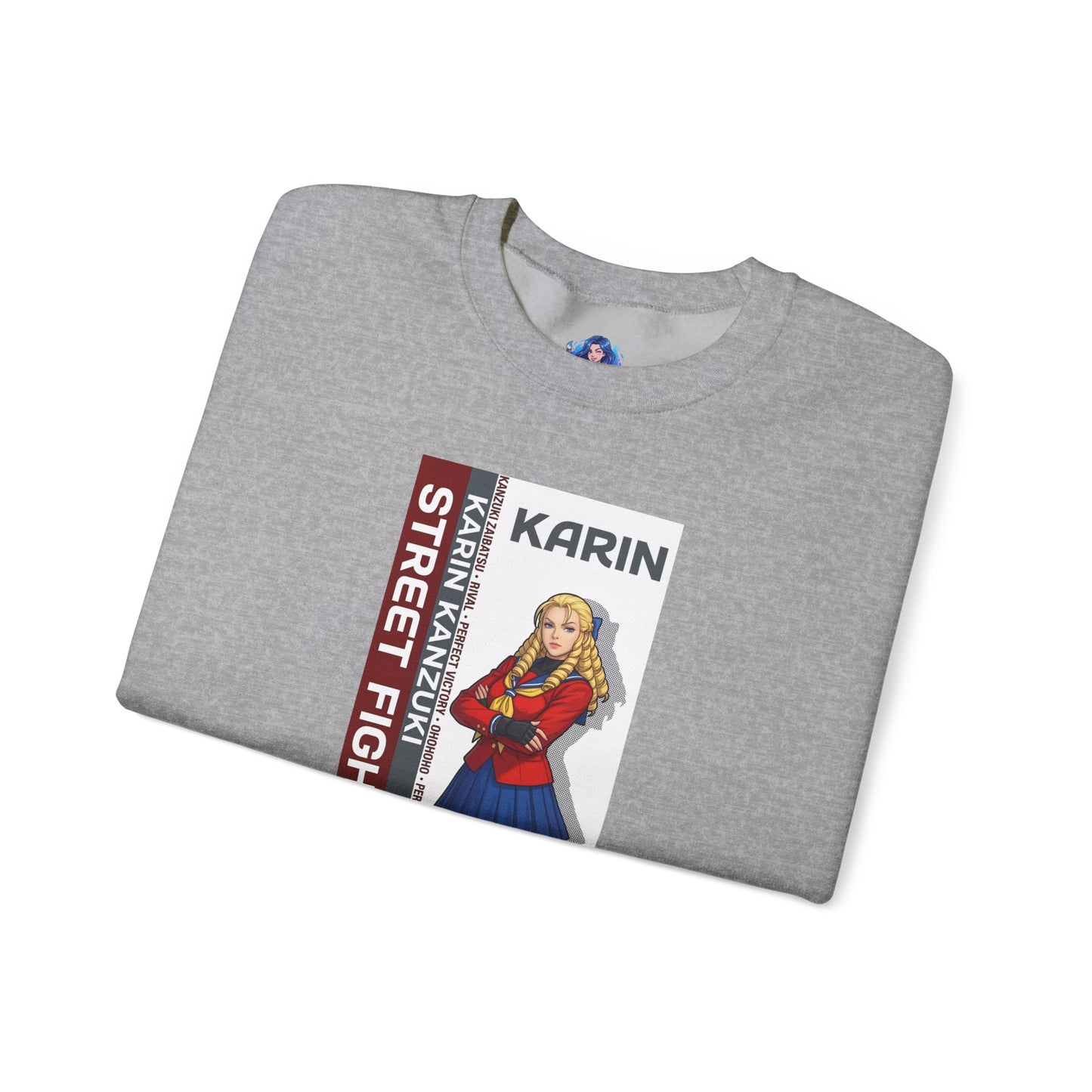 Alt Tag: Karin Sweatshirt, Street Fighter Crewneck, Elegant Fighting Game Apparel for Fans - folded grey crewneck with blonde Karin illustration