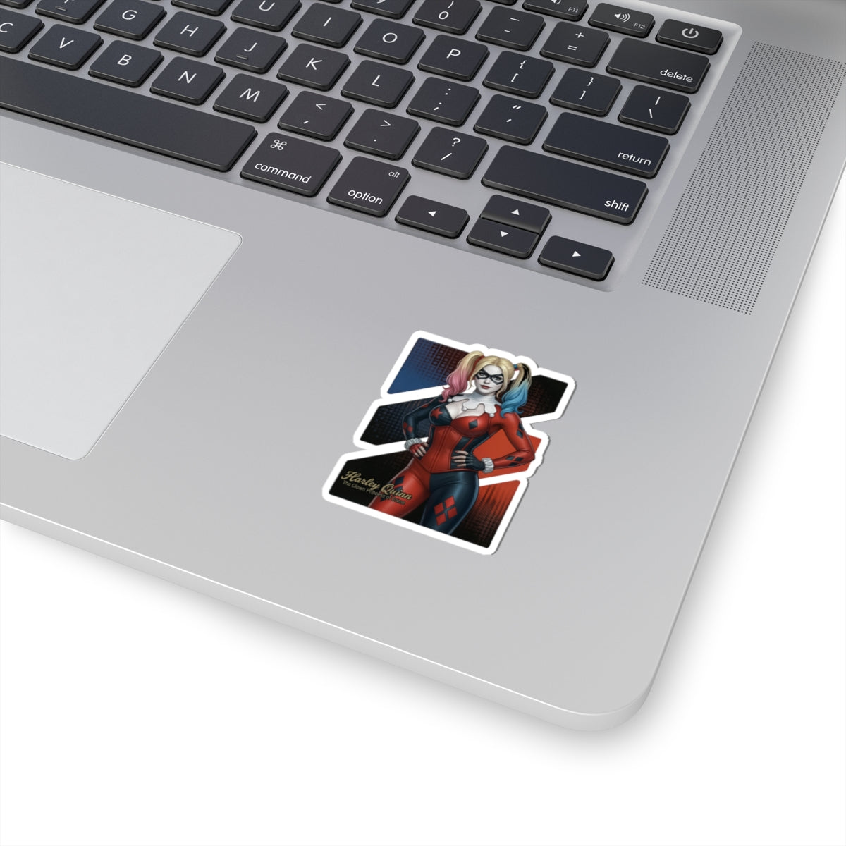 Harley Quinn Sticker – Comic Character Vinyl Sticker for Laptops & Indoor Decor on silver laptop showing glossy, durable vinyl, vibrant colors, bubble-free application