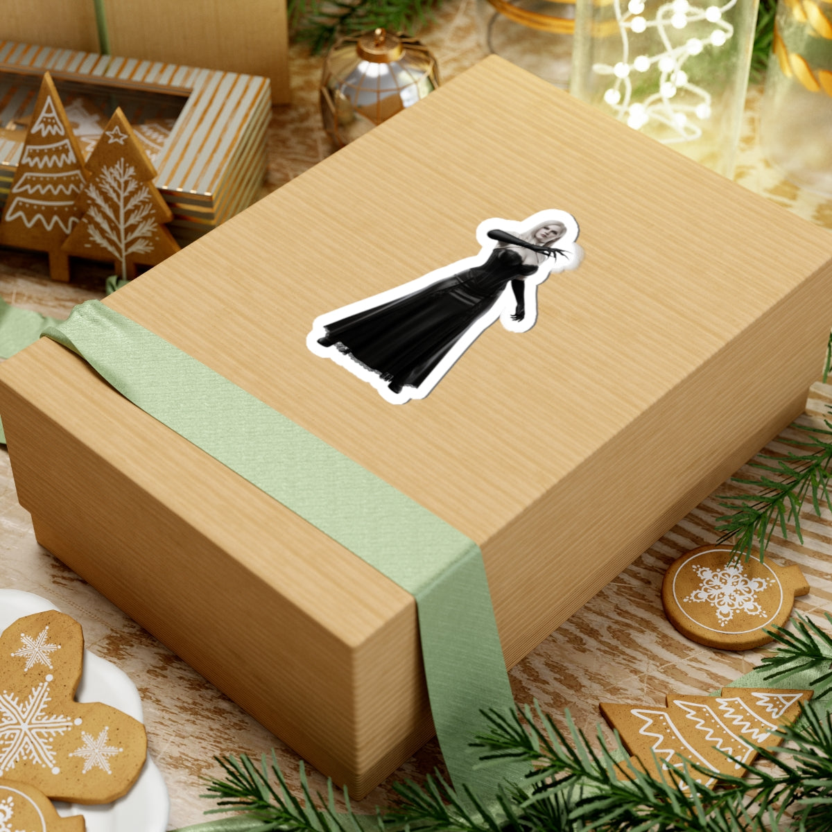 Lady Dimitrescu Sticker – Gothic Game Character Vinyl Sticker for Laptops & Decor applied to gift box, glossy black-and-white vinyl decal showcasing elegant gothic character