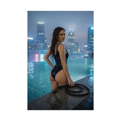 DC Comics Poster – Catwoman Art Print, Superhero Wall Art showing Catwoman in a rooftop pool at night with glowing city skyline and dramatic lighting